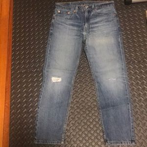 Men’s Levi’s 502 blue jeans.